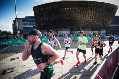 061019 - Cardiff Half Marathon 2019 - Runners make their way through Cardiff Bay, Roald Dahl Plas and past the Wales Millennium Centre at the halfway point of the race