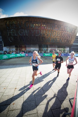 061019 - Cardiff Half Marathon 2019 - Runners make their way through Cardiff Bay, Roald Dahl Plas and past the Wales Millennium Centre at the halfway point of the race