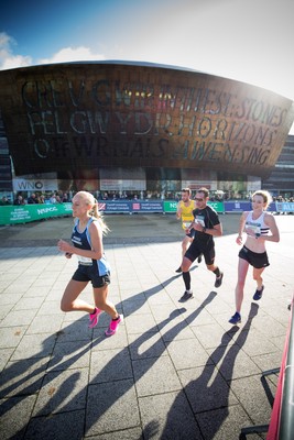 061019 - Cardiff Half Marathon 2019 - Runners make their way through Cardiff Bay, Roald Dahl Plas and past the Wales Millennium Centre at the halfway point of the race