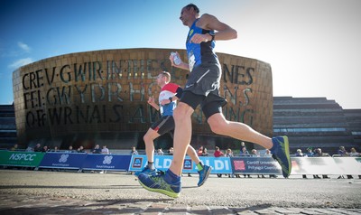 061019 - Cardiff Half Marathon 2019 - Runners make their way through Cardiff Bay, Roald Dahl Plas and past the Wales Millennium Centre at the halfway point of the race