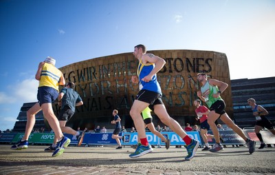 061019 - Cardiff Half Marathon 2019 - Runners make their way through Cardiff Bay, Roald Dahl Plas and past the Wales Millennium Centre at the halfway point of the race