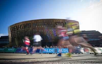 061019 - Cardiff Half Marathon 2019 - Runners make their way through Cardiff Bay, Roald Dahl Plas and past the Wales Millennium Centre at the halfway point of the race