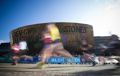 061019 - Cardiff Half Marathon 2019 - Runners make their way through Cardiff Bay, Roald Dahl Plas and past the Wales Millennium Centre at the halfway point of the race