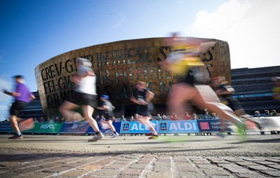 061019 - Cardiff Half Marathon 2019 - Runners make their way through Cardiff Bay, Roald Dahl Plas and past the Wales Millennium Centre at the halfway point of the race