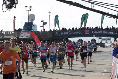 061019 - Cardiff Half Marathon 2019 - Runners make their way through Cardiff Bay, Roald Dahl Plas and past the Wales Millennium Centre at the halfway point of the race