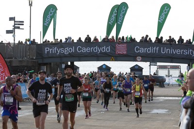 061019 - Cardiff Half Marathon 2019 - Runners make their way through Cardiff Bay, Roald Dahl Plas and past the Wales Millennium Centre at the halfway point of the race