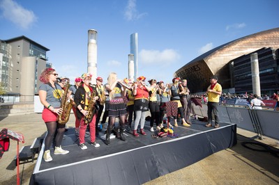 061019 - Cardiff Half Marathon 2019 - Runners make their way through Cardiff Bay, Roald Dahl Plas and past the Wales Millennium Centre at the halfway point of the race