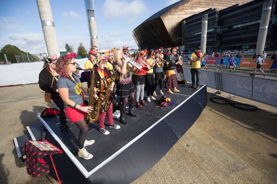 061019 - Cardiff Half Marathon 2019 - Runners make their way through Cardiff Bay, Roald Dahl Plas and past the Wales Millennium Centre at the halfway point of the race