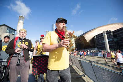 061019 - Cardiff Half Marathon 2019 - Runners make their way through Cardiff Bay, Roald Dahl Plas and past the Wales Millennium Centre at the halfway point of the race