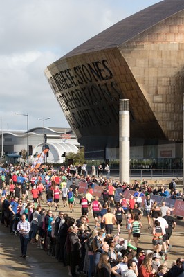 061019 - Cardiff Half Marathon 2019 - Runners make their way through Cardiff Bay, Roald Dahl Plas and past the Wales Millennium Centre at the halfway point of the race