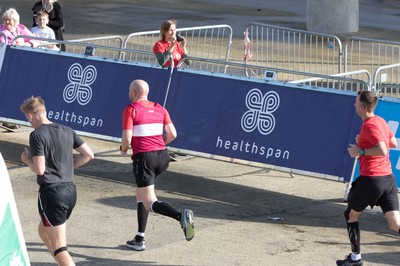 061019 - Cardiff Half Marathon 2019 - Runners make their way through Cardiff Bay, Roald Dahl Plas and past the Wales Millennium Centre at the halfway point of the race