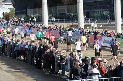 061019 - Cardiff Half Marathon 2019 - Runners make their way through Cardiff Bay, Roald Dahl Plas and past the Wales Millennium Centre at the halfway point of the race