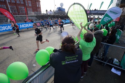 061019 - Cardiff Half Marathon 2019 - Runners make their way through Cardiff Bay, Roald Dahl Plas and past the Wales Millennium Centre at the halfway point of the race