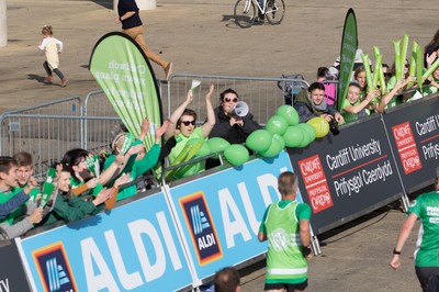 061019 - Cardiff Half Marathon 2019 - Runners make their way through Cardiff Bay, Roald Dahl Plas and past the Wales Millennium Centre at the halfway point of the race