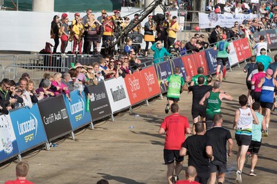 061019 - Cardiff Half Marathon 2019 - Runners make their way through Cardiff Bay, Roald Dahl Plas and past the Wales Millennium Centre at the halfway point of the race