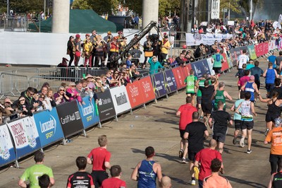 061019 - Cardiff Half Marathon 2019 - Runners make their way through Cardiff Bay, Roald Dahl Plas and past the Wales Millennium Centre at the halfway point of the race