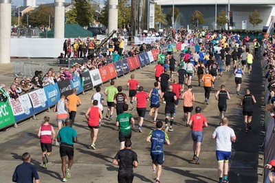 061019 - Cardiff Half Marathon 2019 - Runners make their way through Cardiff Bay, Roald Dahl Plas and past the Wales Millennium Centre at the halfway point of the race