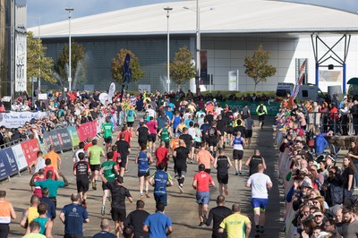 061019 - Cardiff Half Marathon 2019 - Runners make their way through Cardiff Bay, Roald Dahl Plas and past the Wales Millennium Centre at the halfway point of the race