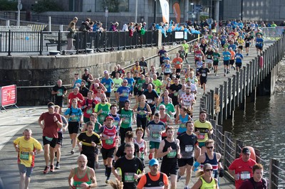 061019 - Cardiff Half Marathon 2019 - Runners make their way through Cardiff Bay, Roald Dahl Plas and past the Wales Millennium Centre at the halfway point of the race