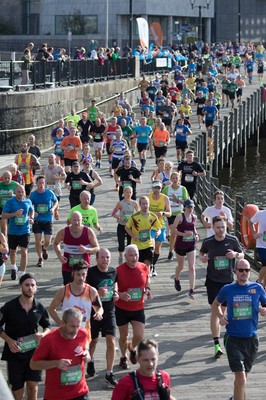 061019 - Cardiff Half Marathon 2019 - Runners make their way through Cardiff Bay, Roald Dahl Plas and past the Wales Millennium Centre at the halfway point of the race