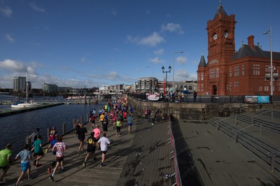 061019 - Cardiff Half Marathon 2019 - Runners make their way through Cardiff Bay, Roald Dahl Plas and past the Wales Millennium Centre at the halfway point of the race