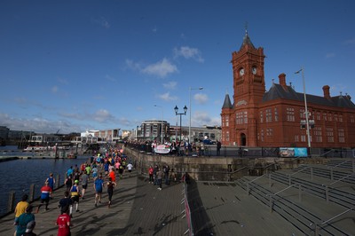 061019 - Cardiff Half Marathon 2019 - Runners make their way through Cardiff Bay, Roald Dahl Plas and past the Wales Millennium Centre at the halfway point of the race