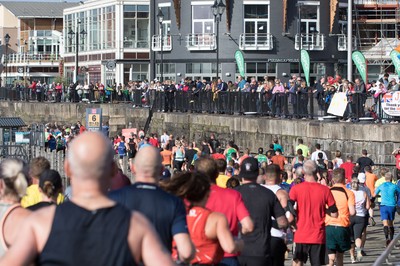 061019 - Cardiff Half Marathon 2019 - Runners make their way through Cardiff Bay, Roald Dahl Plas and past the Wales Millennium Centre at the halfway point of the race