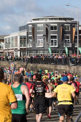 061019 - Cardiff Half Marathon 2019 - Runners make their way through Cardiff Bay, Roald Dahl Plas and past the Wales Millennium Centre at the halfway point of the race