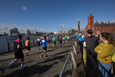 061019 - Cardiff Half Marathon 2019 - Runners make their way through Cardiff Bay, Roald Dahl Plas and past the Wales Millennium Centre at the halfway point of the race