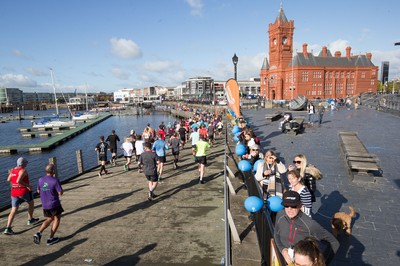 061019 - Cardiff Half Marathon 2019 - Runners make their way through Cardiff Bay, Roald Dahl Plas and past the Wales Millennium Centre at the halfway point of the race