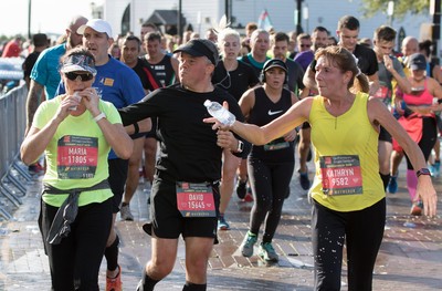 061019 - Cardiff Half Marathon 2019 - Runners make their way through Cardiff Bay, Roald Dahl Plas and past the Wales Millennium Centre at the halfway point of the race