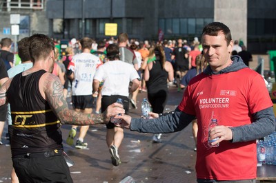 061019 - Cardiff Half Marathon 2019 - Runners make their way through Cardiff Bay, Roald Dahl Plas and past the Wales Millennium Centre at the halfway point of the race