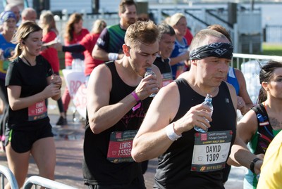 061019 - Cardiff Half Marathon 2019 - Runners make their way through Cardiff Bay, Roald Dahl Plas and past the Wales Millennium Centre at the halfway point of the race