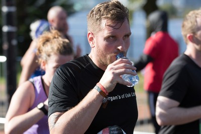 061019 - Cardiff Half Marathon 2019 - Runners make their way through Cardiff Bay, Roald Dahl Plas and past the Wales Millennium Centre at the halfway point of the race