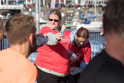 061019 - Cardiff Half Marathon 2019 - Runners make their way through Cardiff Bay, Roald Dahl Plas and past the Wales Millennium Centre at the halfway point of the race