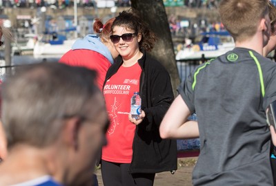 061019 - Cardiff Half Marathon 2019 - Runners make their way through Cardiff Bay, Roald Dahl Plas and past the Wales Millennium Centre at the halfway point of the race