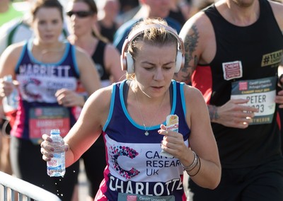 061019 - Cardiff Half Marathon 2019 - Runners make their way through Cardiff Bay, Roald Dahl Plas and past the Wales Millennium Centre at the halfway point of the race