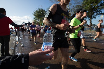 061019 - Cardiff Half Marathon 2019 - Runners make their way through Cardiff Bay, Roald Dahl Plas and past the Wales Millennium Centre at the halfway point of the race