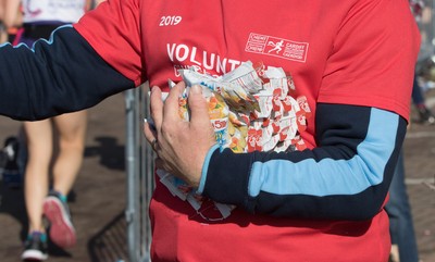 061019 - Cardiff Half Marathon 2019 - Runners make their way through Cardiff Bay, Roald Dahl Plas and past the Wales Millennium Centre at the halfway point of the race