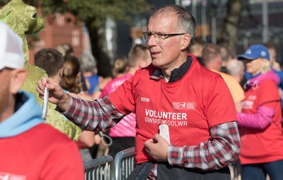 061019 - Cardiff Half Marathon 2019 - Runners make their way through Cardiff Bay, Roald Dahl Plas and past the Wales Millennium Centre at the halfway point of the race