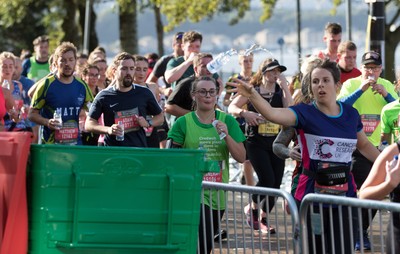 061019 - Cardiff Half Marathon 2019 - Runners make their way through Cardiff Bay, Roald Dahl Plas and past the Wales Millennium Centre at the halfway point of the race