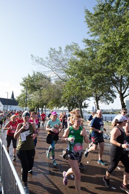 061019 - Cardiff Half Marathon 2019 - Runners make their way through Cardiff Bay, Roald Dahl Plas and past the Wales Millennium Centre at the halfway point of the race