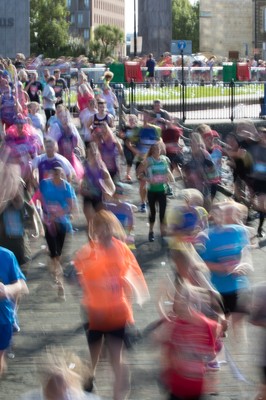 061019 - Cardiff Half Marathon 2019 - Runners make their way through Cardiff Bay, Roald Dahl Plas and past the Wales Millennium Centre at the halfway point of the race