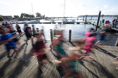 061019 - Cardiff Half Marathon 2019 - Runners make their way through Cardiff Bay, Roald Dahl Plas and past the Wales Millennium Centre at the halfway point of the race