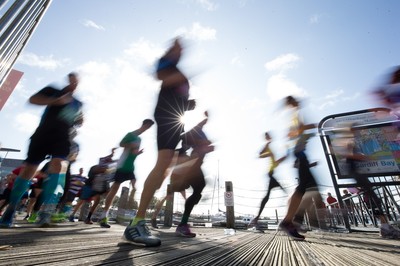 061019 - Cardiff Half Marathon 2019 - Runners make their way through Cardiff Bay, Roald Dahl Plas and past the Wales Millennium Centre at the halfway point of the race