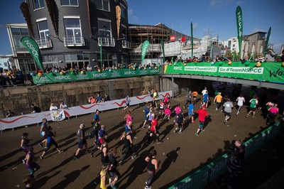 061019 - Cardiff Half Marathon 2019 - Runners make their way through Cardiff Bay, Roald Dahl Plas and past the Wales Millennium Centre at the halfway point of the race