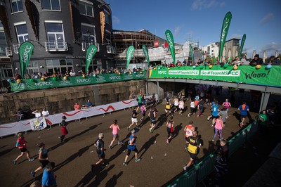 061019 - Cardiff Half Marathon 2019 - Runners make their way through Cardiff Bay, Roald Dahl Plas and past the Wales Millennium Centre at the halfway point of the race