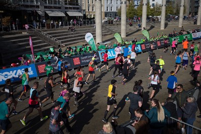 061019 - Cardiff Half Marathon 2019 - Runners make their way through Cardiff Bay, Roald Dahl Plas and past the Wales Millennium Centre at the halfway point of the race