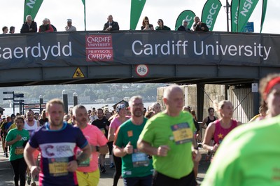 061019 - Cardiff Half Marathon 2019 - Runners make their way through Cardiff Bay, Roald Dahl Plas and past the Wales Millennium Centre at the halfway point of the race