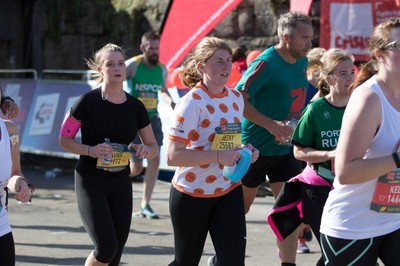 061019 - Cardiff Half Marathon 2019 - Runners make their way through Cardiff Bay, Roald Dahl Plas and past the Wales Millennium Centre at the halfway point of the race